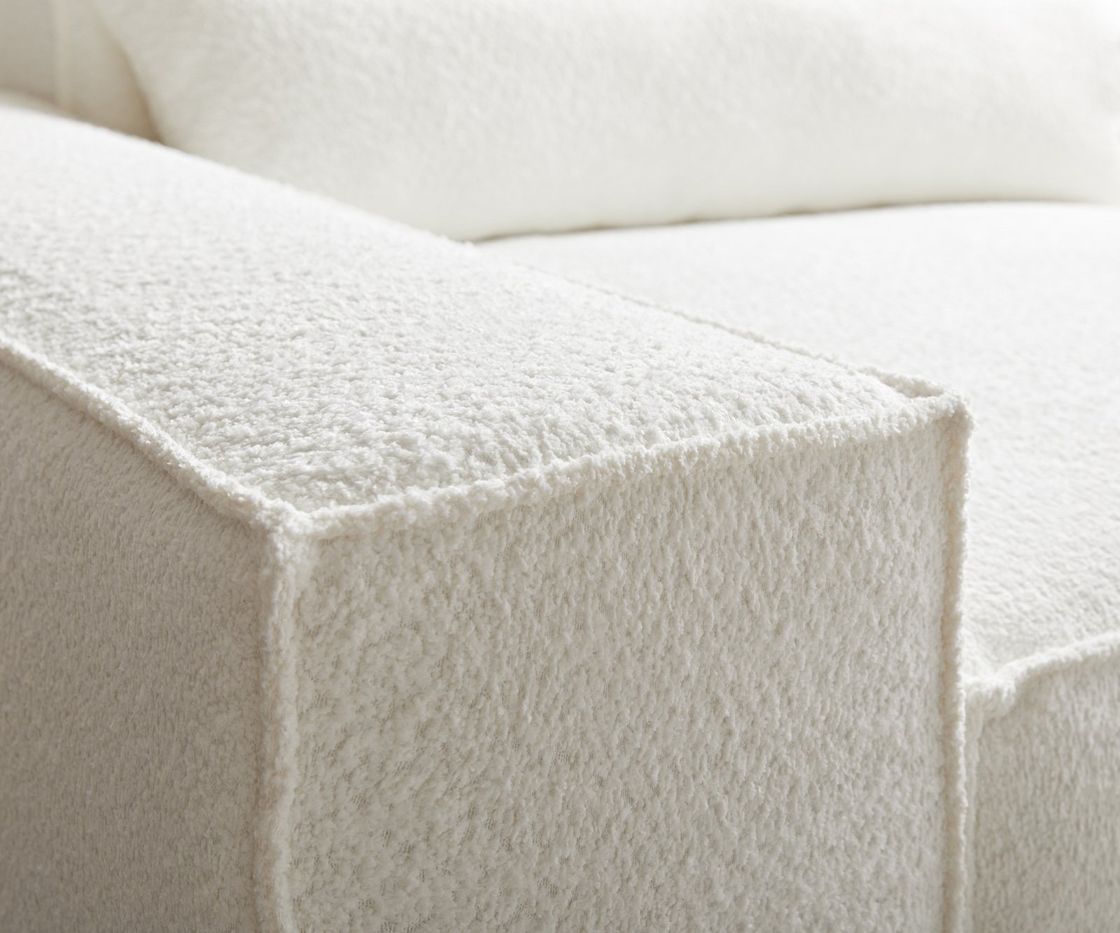 Pohovka ve tvaru "U" Sirpio 300x200 cm bouclé krémovo-bílá lenoška variabilní s taburetem - Obrázek 6