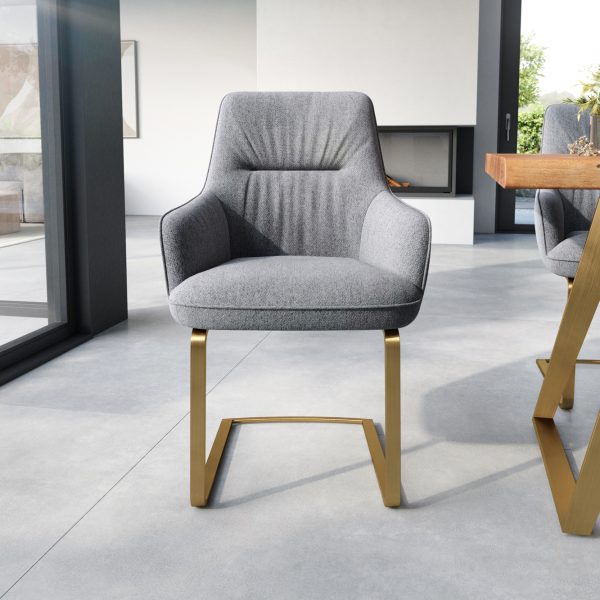 Jídelní židle Zelia-Flex s područkou konzolová podnož plochá zlatá texturovaná tkanina světle šedá